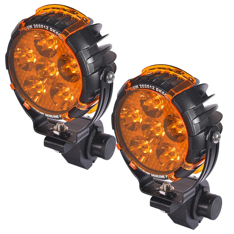 Two round amber LED lights with black casings on a white background