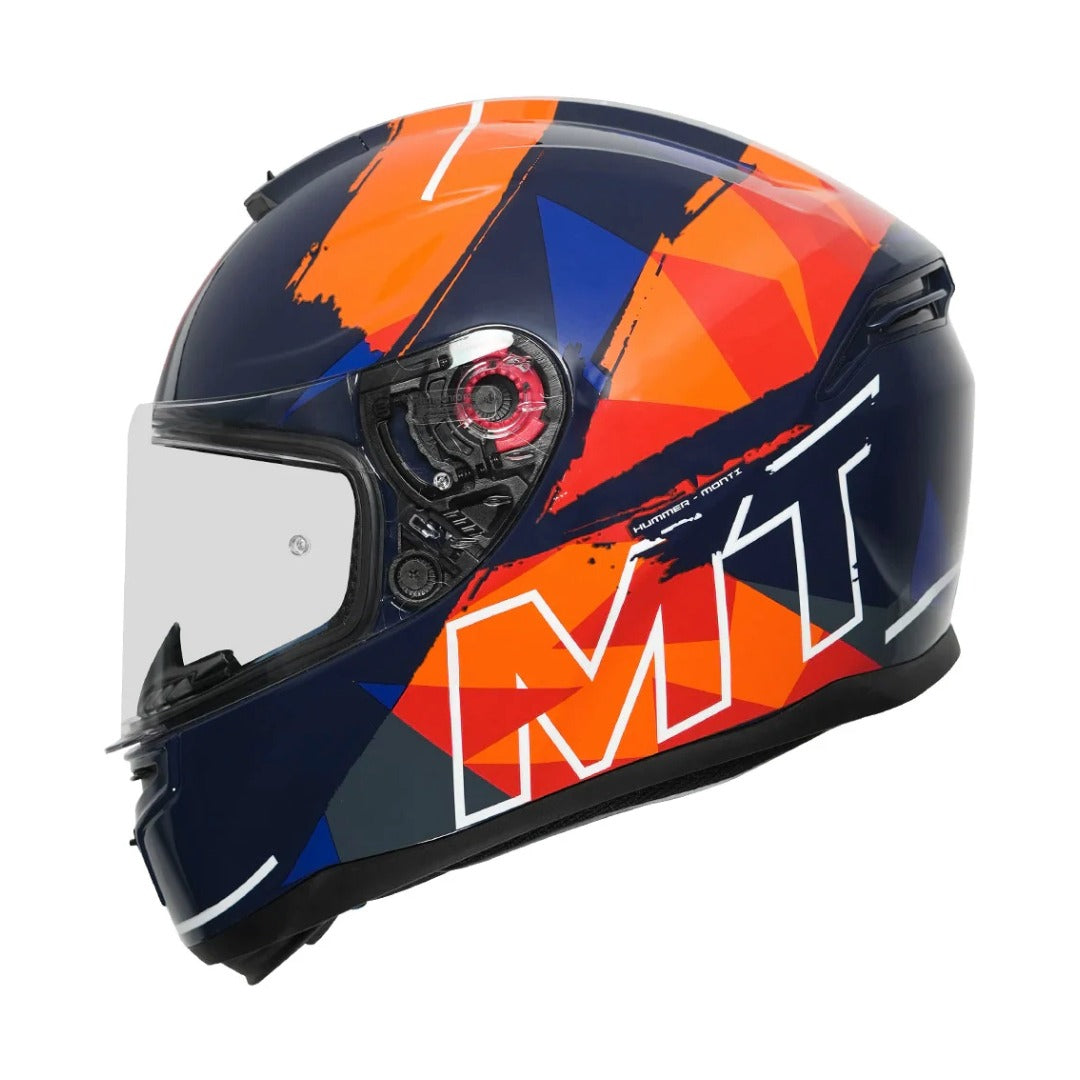 Colorful motorcycle helmet with geometric design and 'MT' branding on a white background