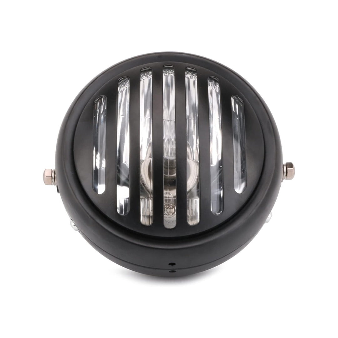 Round black light fixture with metallic grille on a white background