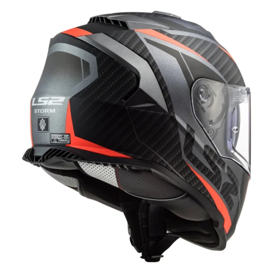 Black and orange motorcycle helmet with clear visor on a white background